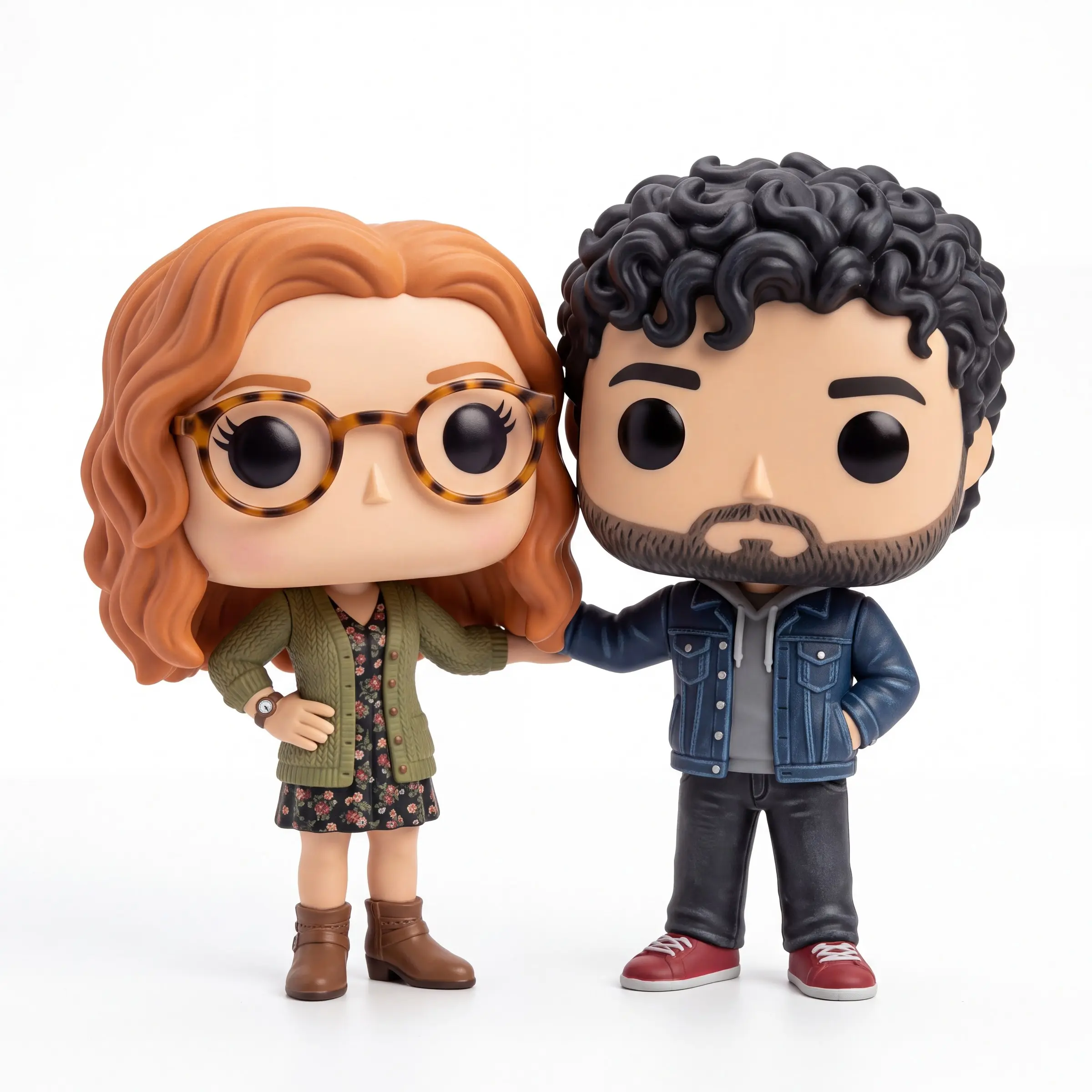 Big-head vinyl collectible figures standing on a white background